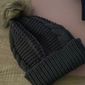 Army green winter beanie with pouf